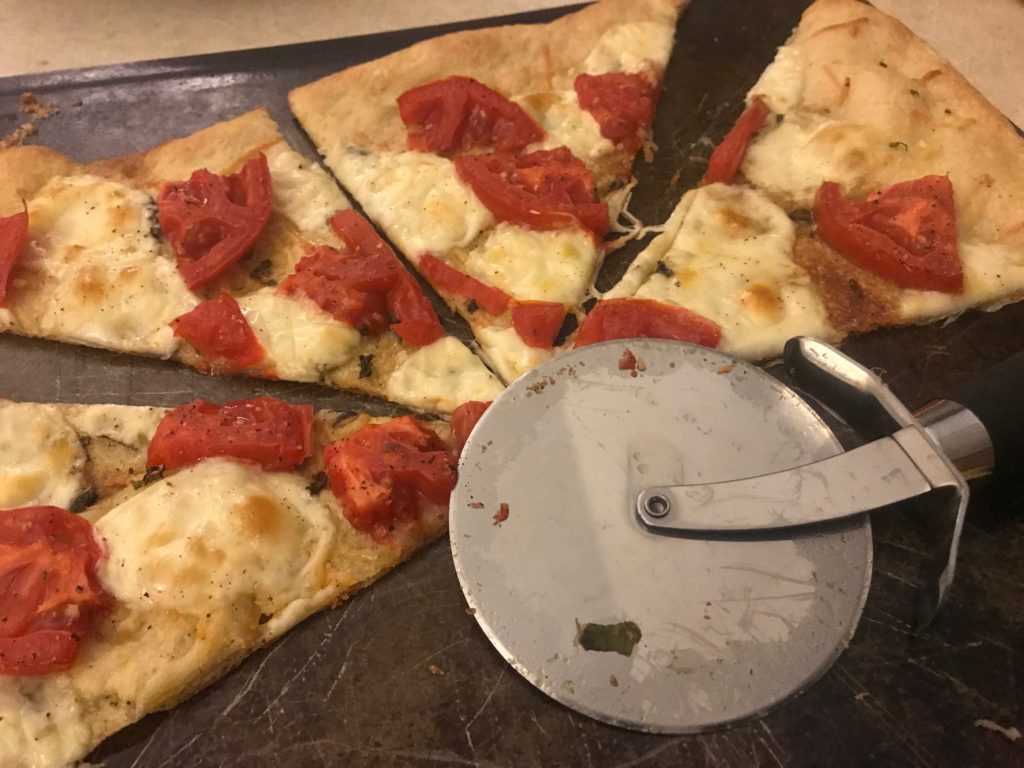 pizza with cutter